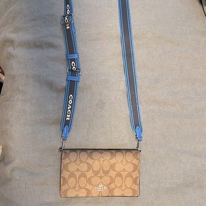 Brand New Coach Crossbody bag. Canvas and blue leather.